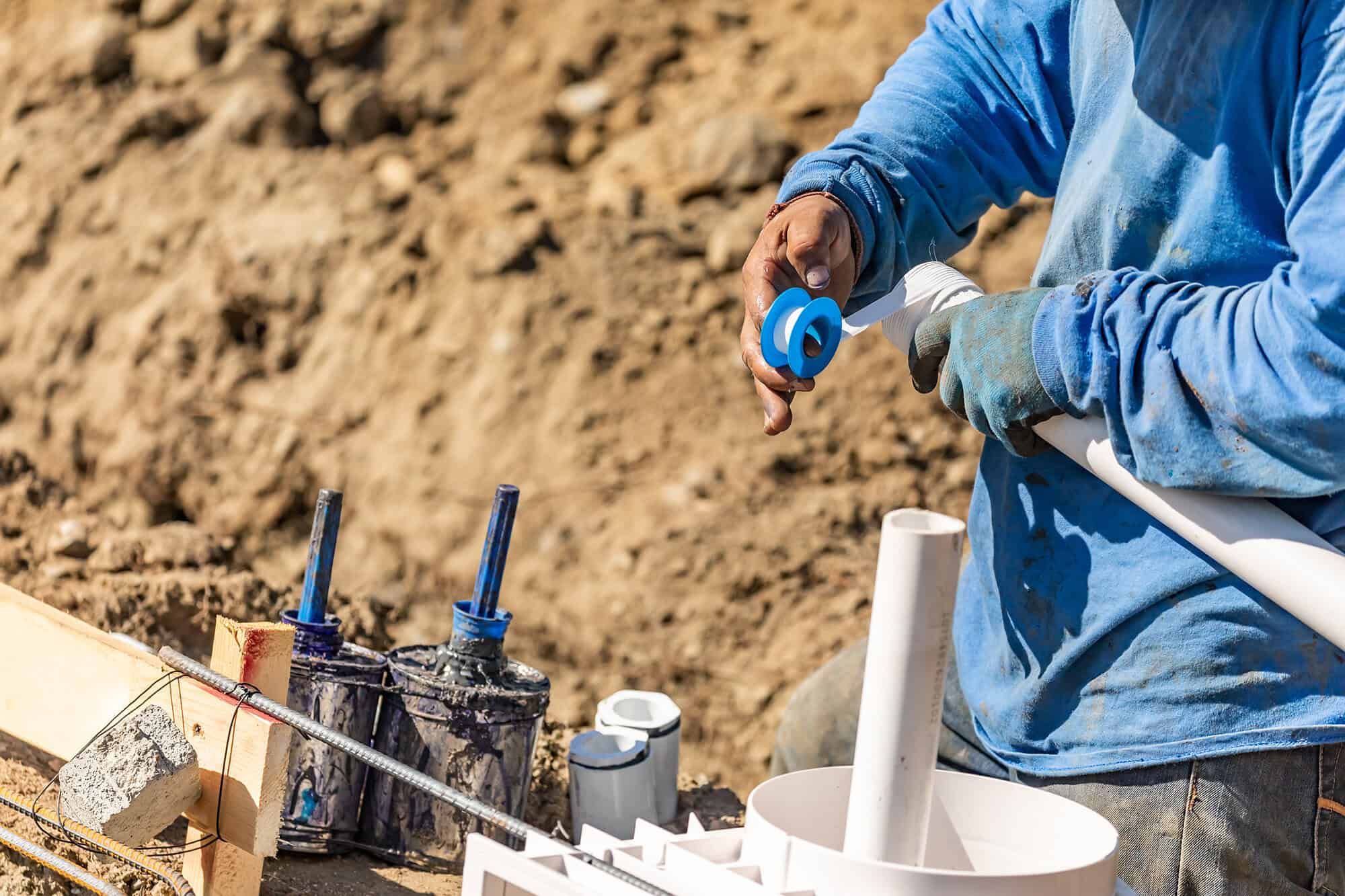 Plumber making a repair on a water leak